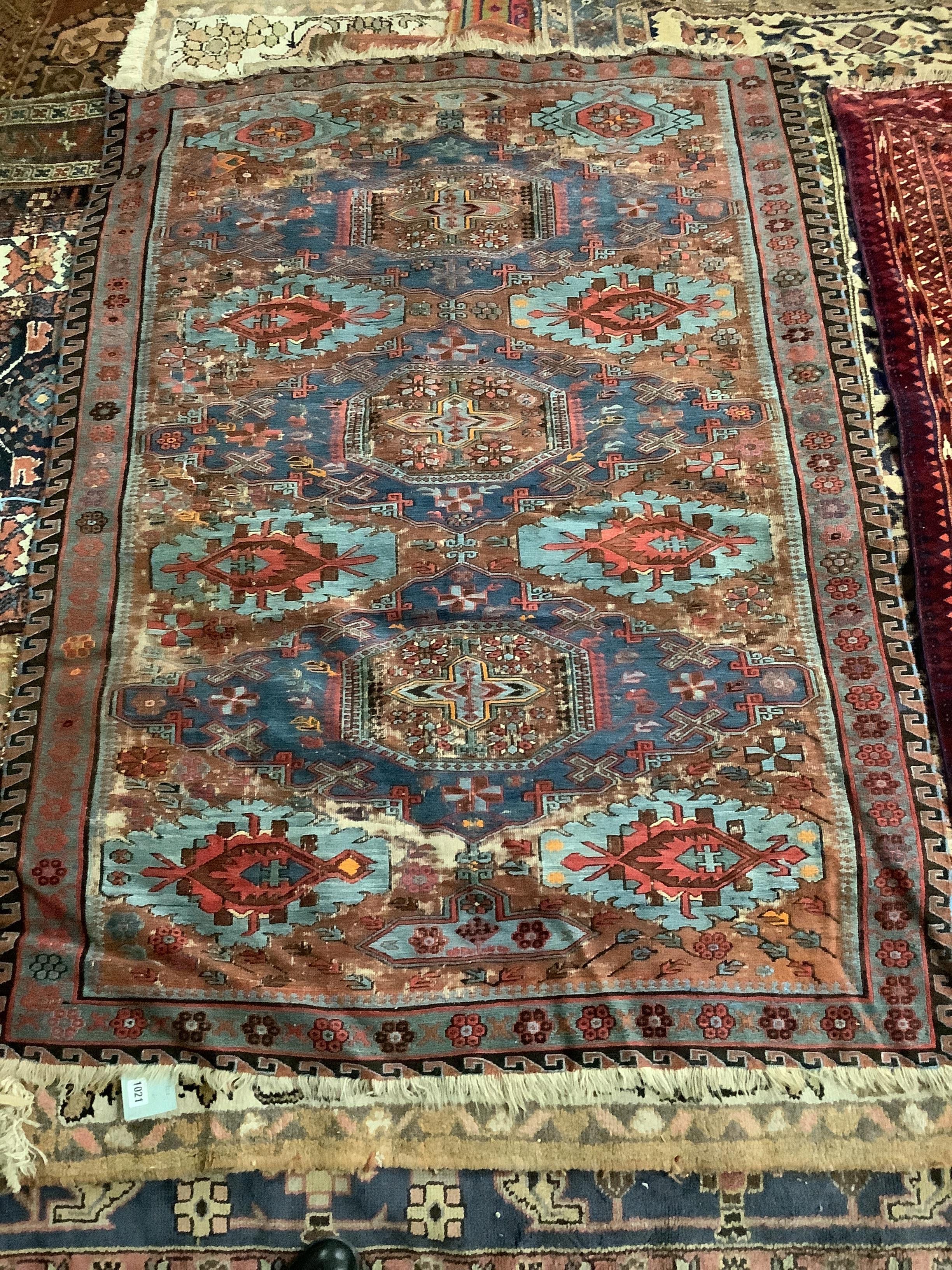 A Soumak blue ground rug, 181 x 125cm